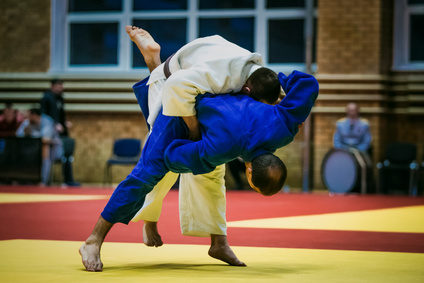 athletes judoists men during fight in judo competitions